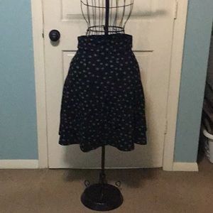 New with tags. Black w/grey polka dot skirt